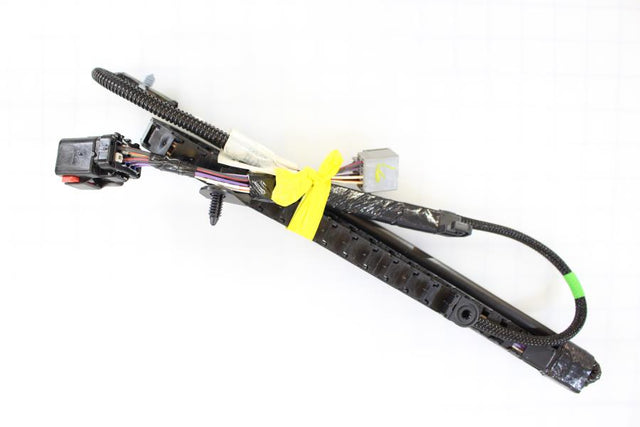 Car window regulator with wiring on a white background